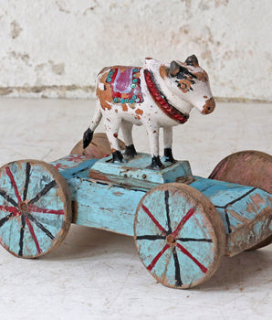 Vintage Blue and White Cow On Wheels