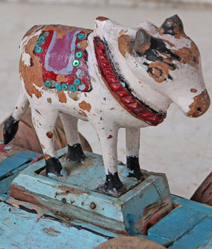 Vintage Blue and White Cow On Wheels